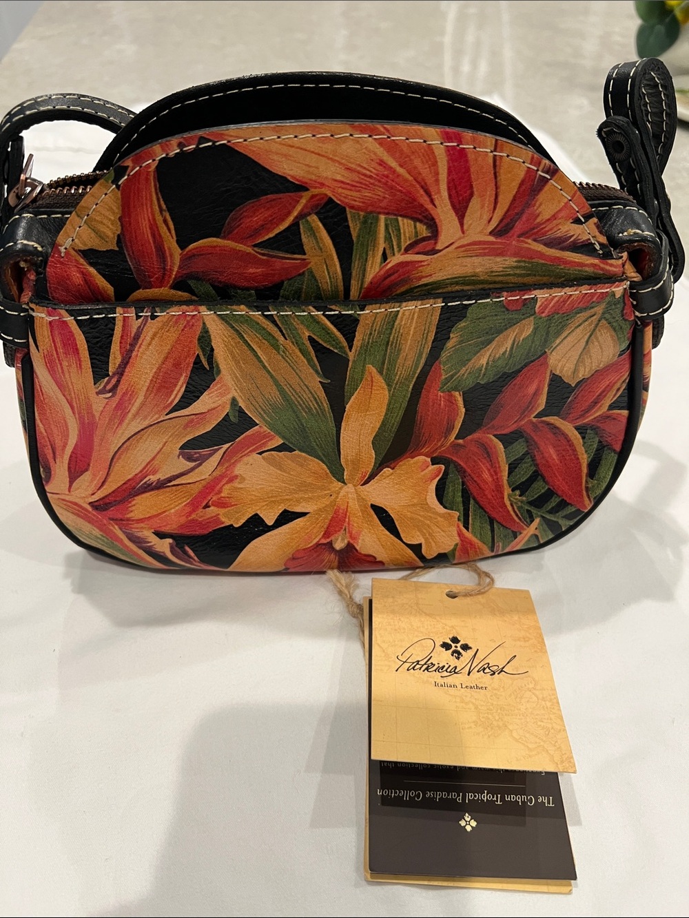 Patricia Nash Black Leather Crossbody with Orange & Green Floral Print